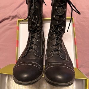 Black leather combat boots